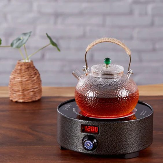 Cast iron teapot warmer